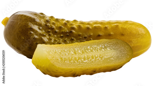 Tableau sur toile Green pickled cucumber half with visible seeds and brine droplets