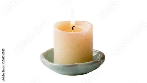 Burning Beige Candle on Ceramic Saucer with Dripped Wax