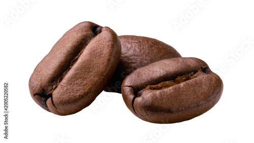 Quadro su tela Dark roasted coffee beans trio close-up view