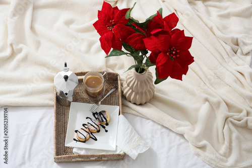 Cozy breakfast in bed with ...
