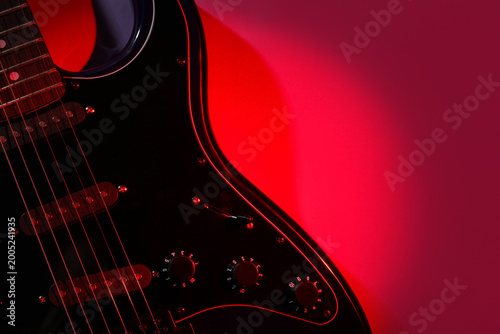 Modern electric guitar on r...