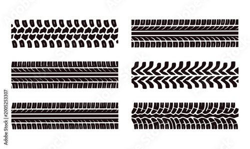 Photos Collection of six detailed black tire track patterns and tyre tread marks isolated on a white background