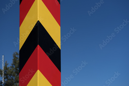 STATE BORDER POST - The German border is marked with posts in national colors 