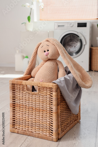 Wicker basket with toy bunn...