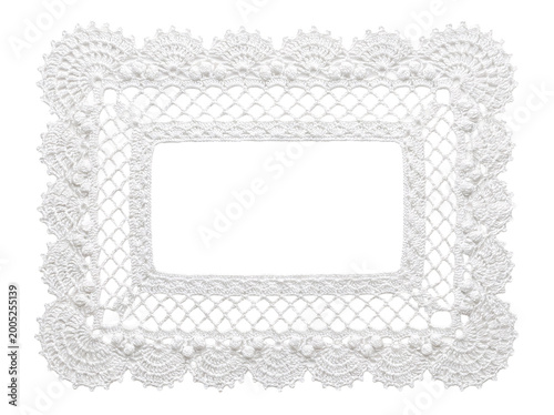 Tableau sur toile Delicate white crochet rectangular doily with ornate lacy border.
