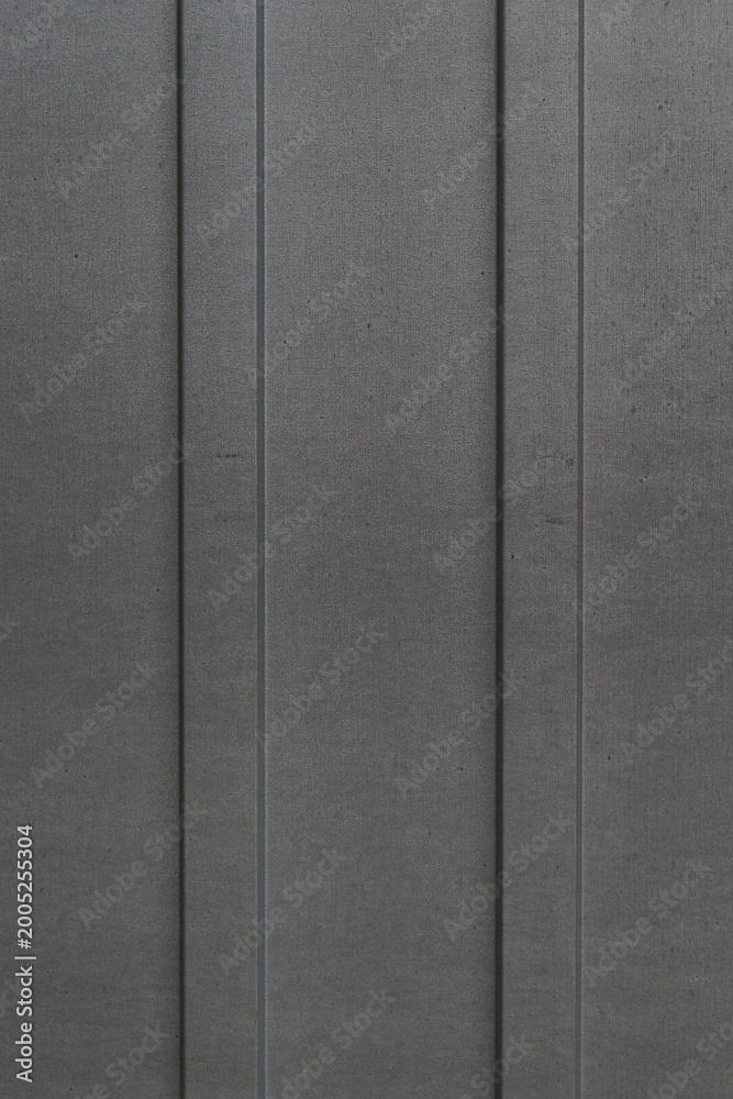 Fototapeta premium Dark gray metal panels with vertical lines