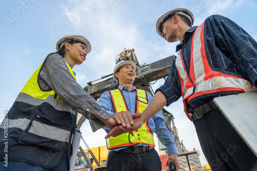 Asian Logistics Professionals Joining Hands for Team Unity at Thailand Container Port Terminal
