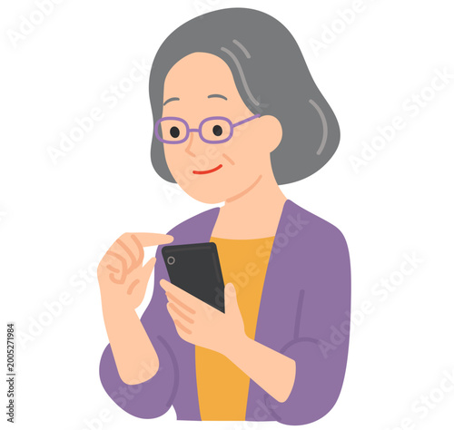 Foto スマートフォンを操作するシニア女性