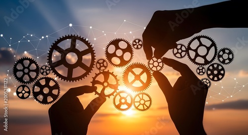Systems thinking concept, human hands arranging interconnected, dramatic sunset sky, symbol of teamwork and integration