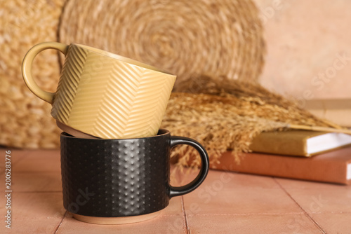 Different ceramic mugs with...