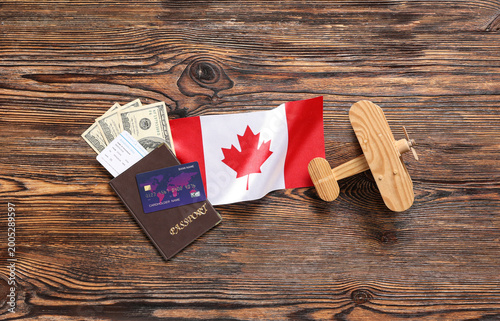 Canadian flag, toy plane, m...