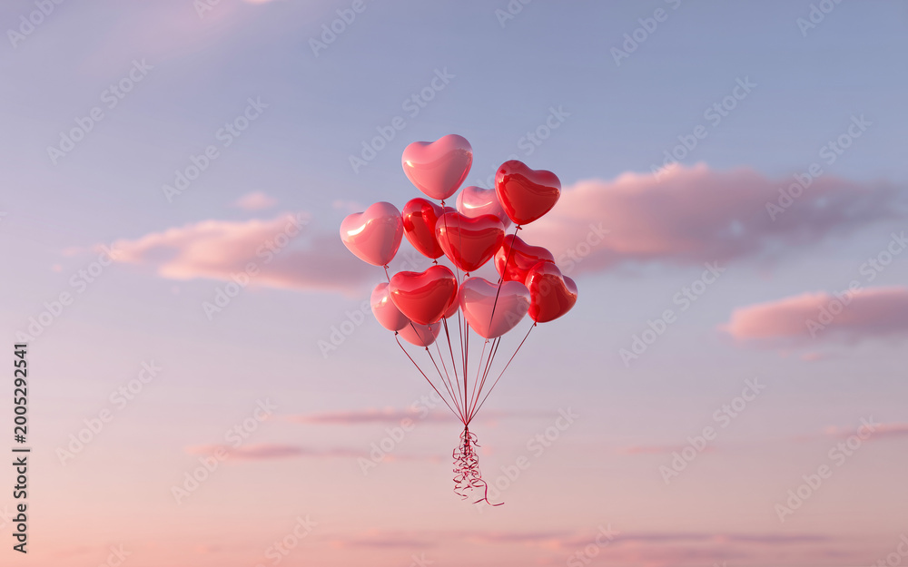 Fototapeta premium Bunch of red and pink heart balloons floating in sunset sky