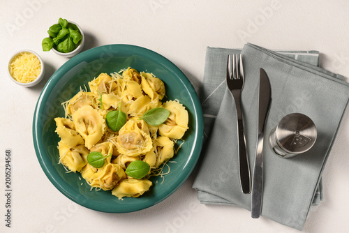 Bowl of boiled dumplings wi...