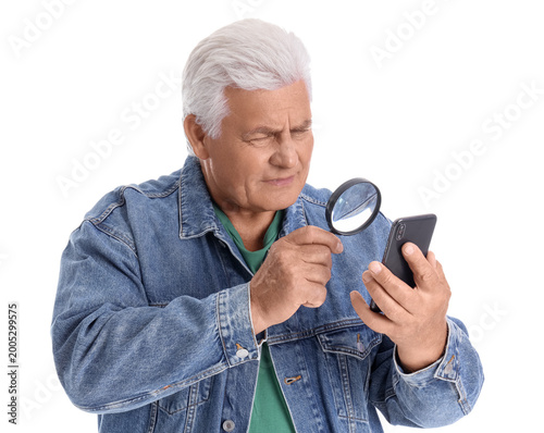 Senior man with mobile phon...