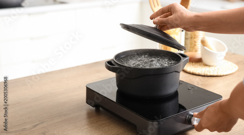 Female hands and cooking po...