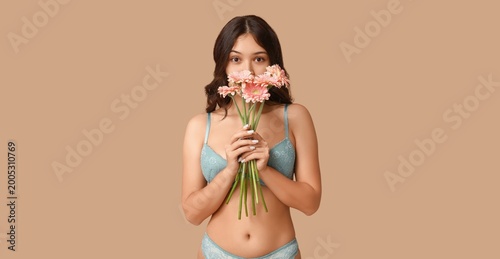 Beautiful young Asian woman...