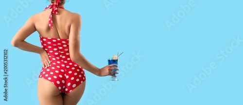 Attractive young woman in p...
