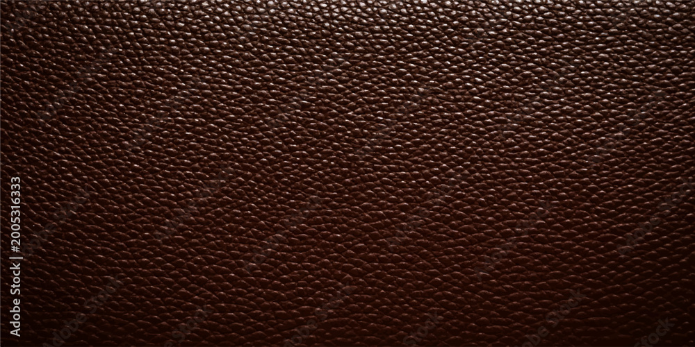 Fototapeta premium A closeup of dark brown and black leather texture backgrounds showing the natural macro skin pattern of the rough animal material surface for luxury fashion textile design wallpaper