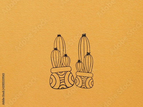 The yellow background in the image is made of black wire, intricately patterned to resemble a medicinal herb, used for decorative wall art. This beautiful artwork can be displayed on walls in homes or