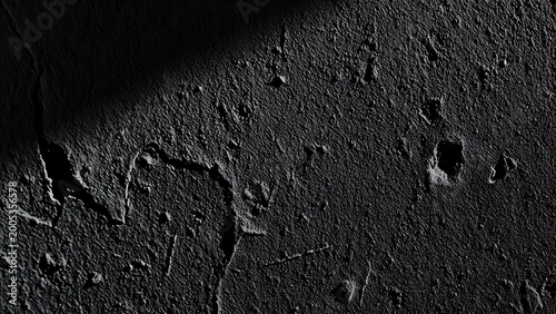 Close-up of a textured dark concrete wall with rough patterns and natural shadows, highlighting macro details.