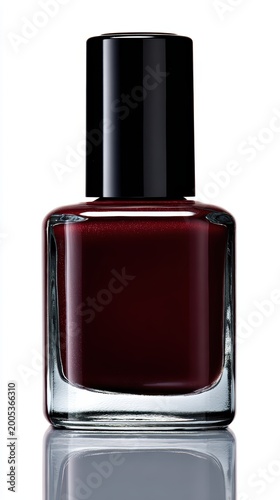 Glossy nail polish bottle in deep burgundy shade with glass bottle and black cap and brush detail, close-up product shot perfect for manicure and beauty concept