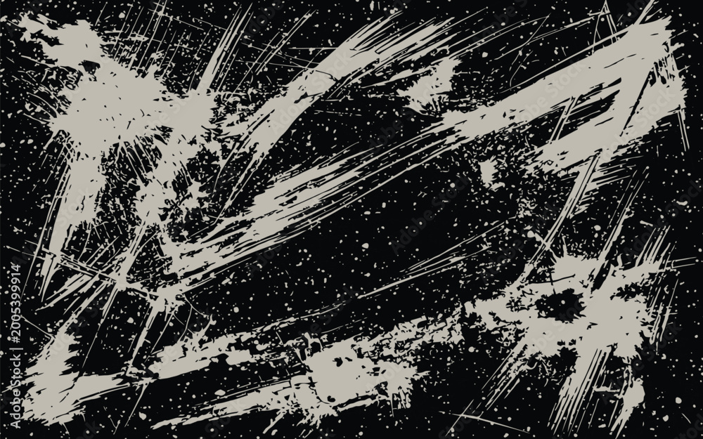 Obraz premium A grungy black background with white scratches and splatters everywhere
