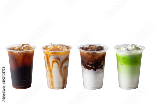 four refreshing iced coffee drinks with layered flavors in clear cups on white background
