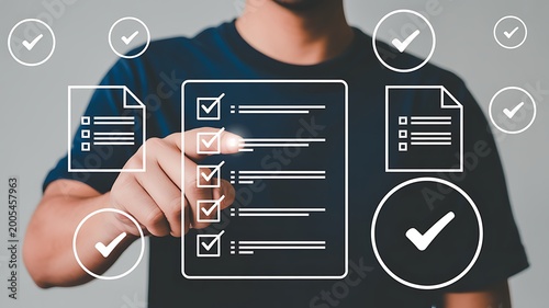 Man interacting with digital checklist and documents indicating completed tasks and project management in modern business settings