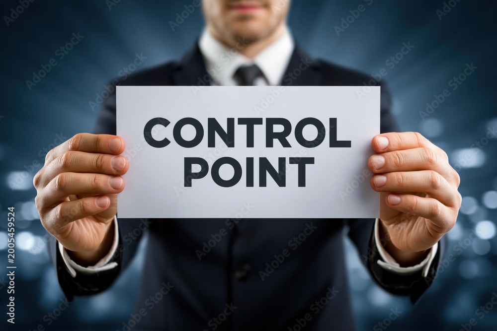 Obraz premium Businessman Showing a Control Point Sign