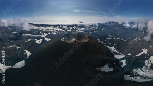 Photos Aerial view of Okmok Volcano caldera with crater lake and glacial snow, Umnak Is