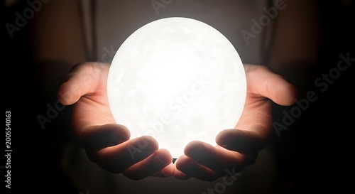The soft radiance of a celestial orb cradled in human hands, evoking wonder, profound mystery, and the promise of discovery in an uncertain future