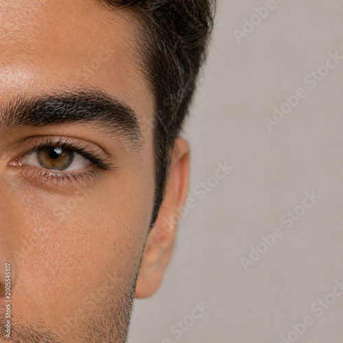 Male eyebrow close up with natural skin texture, grooming and masculine beauty concept