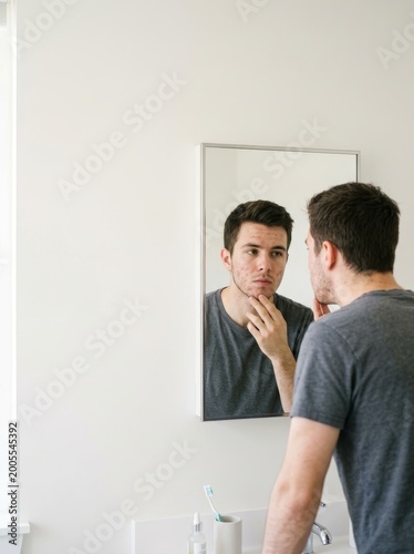 Grooming routine reflection bathroom lifestyle image modern environment close-up view self-care concept
