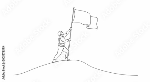 Fotografija Man standing on hill with flag.