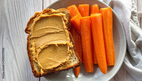 Healthy Snack of Toast with Peanut Butter and Fresh Carrots