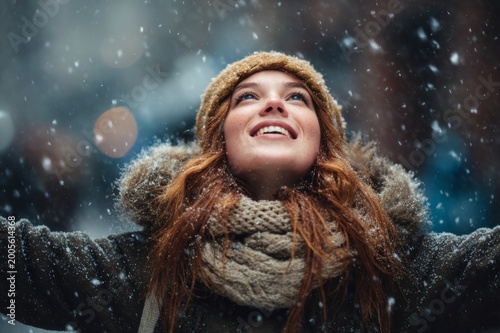 Happy Young Woman Enjoying Snowfall on a Magical Winter Evening