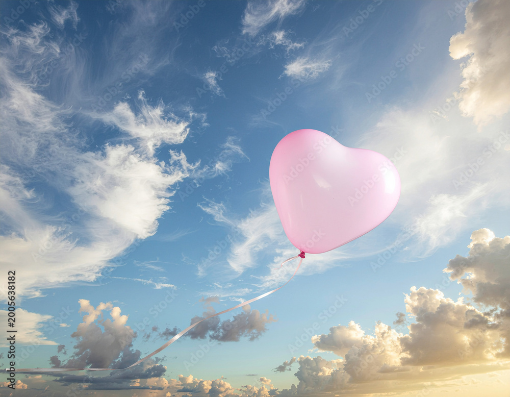 Fototapeta premium Pink Heart Balloon Floating in Bright Blue Sky