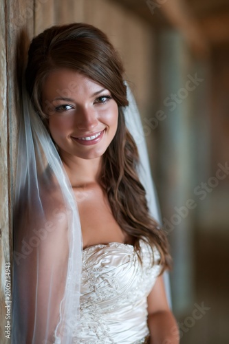Free Download Happy bride smiling against rustic wooden wall - GFXLoad