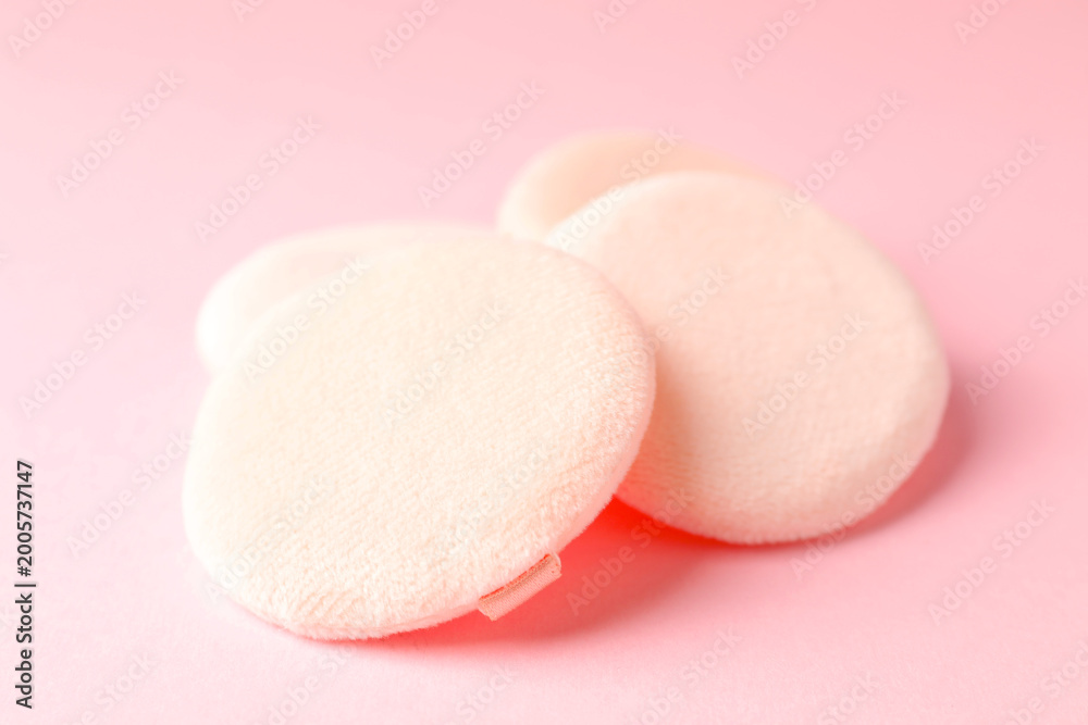 Fototapeta premium Clean makeup sponges on pink background, closeup