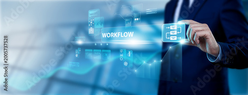 Process Architect Hand Holding Workflow Interface on Digital Screen, mapping operational sequences. Automating business steps to reduce bottlenecks and improve departmental throughput.