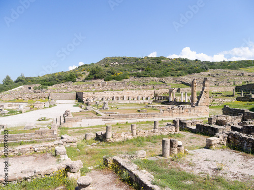 Classical ancient Kamiros, Rhodes, Greece. View of the excavated Doric city set on a beautiful hillside above the Aegean. One of the three city states of the island. Well preserved Hellenistic city. 