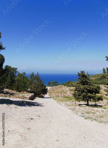 Ancient  Kamiros, Rhodes, Greece. View of the excavated Doric city set on a hillside above the Aegean.  One of the three city states of the island. Well preserved classical city.