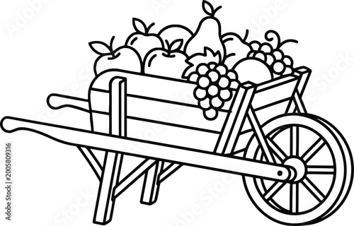Cuadro en lienzo Harvest bounty a wheelbarrow overflowing with fresh fruits