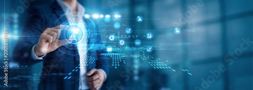 Foto A data researcher's hand holds a tablet for Statistical Analysis, mining data through a complex math network system