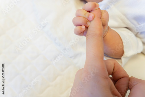 A newborn baby's hand