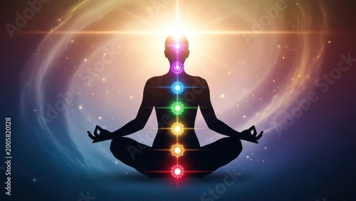 Mystical meditation practice with chakra alignment under cosmic glow backdrop