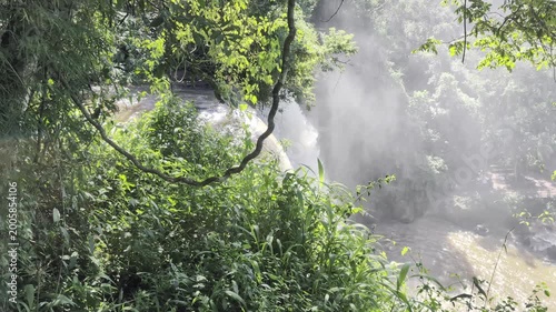 An aerial view of the Iguazu Falls and mist in the sunlight at Iguazu National Park and Reserve in Argentina in June.
