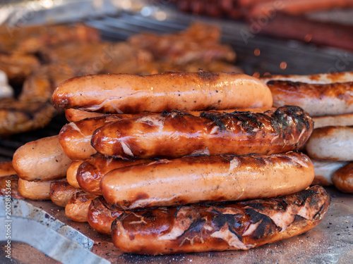  Deliciously Grilled Deutsche Bratwurst Stacked on a Grill