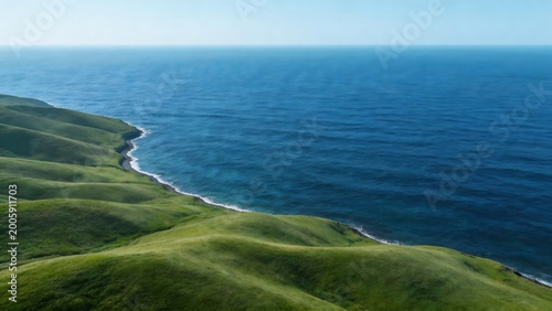 Coastal landscape with green hills and blue ocean