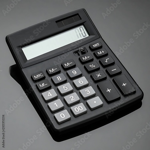 A black calculator on a gray background